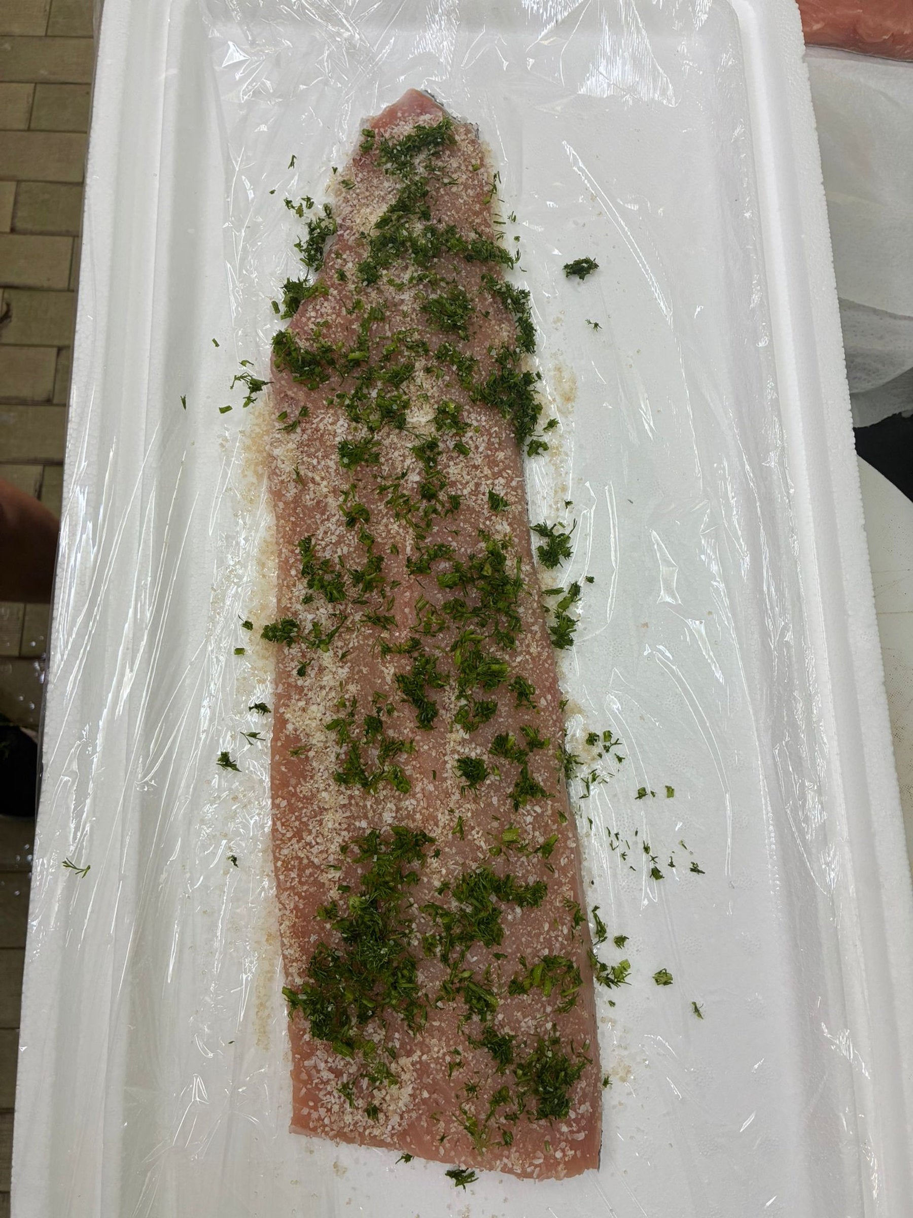 These images capture the full journey of wild keta salmon line‑caught from British Columbia and cold‑smoked naturally in Singapore by DishTheFish. From whole fresh salmon to fillets cured with dill, salt, and brown sugar, then smoked in commercial Alto‑Shaam ovens, each stage is shown clearly for accessibility. The alt text highlights Singapore as the processing location and emphasizes keywords like wild keta salmon, cold smoked, fresh dill, and DishTheFish Singapore, ensuring the visuals