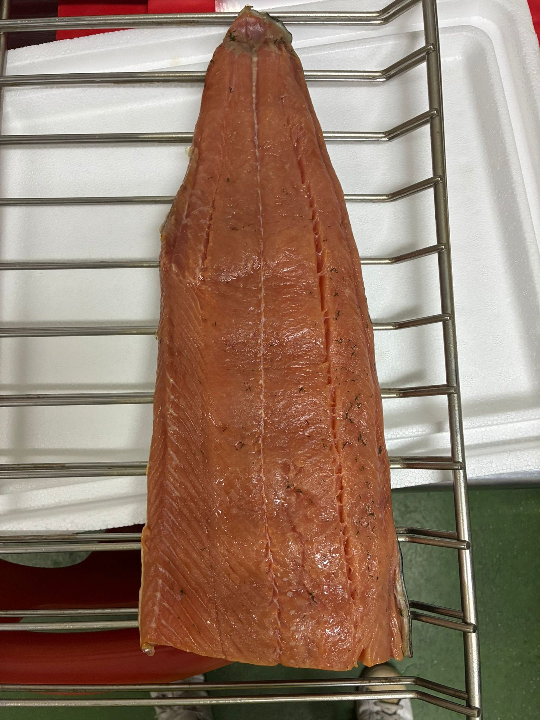 These images capture the full journey of wild keta salmon line‑caught from British Columbia and cold‑smoked naturally in Singapore by DishTheFish. From whole fresh salmon to fillets cured with dill, salt, and brown sugar, then smoked in commercial Alto‑Shaam ovens, each stage is shown clearly for accessibility. The alt text highlights Singapore as the processing location and emphasizes keywords like wild keta salmon, cold smoked, fresh dill, and DishTheFish Singapore, ensuring the visuals