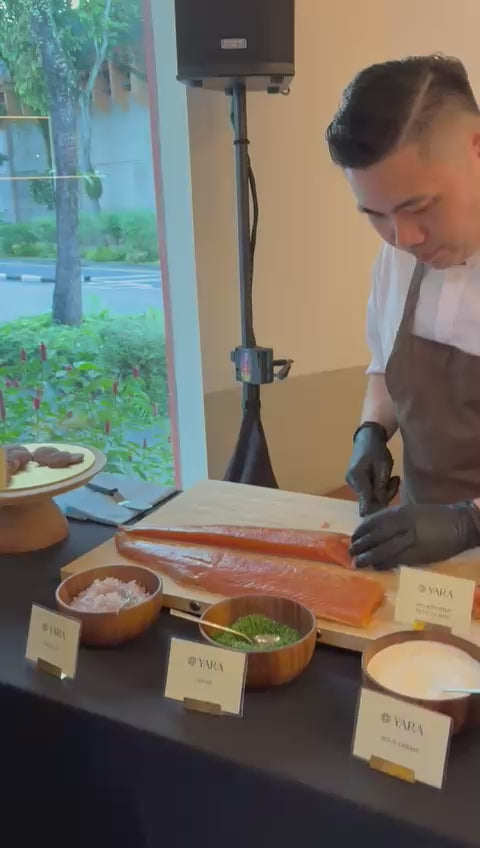 These images capture the full journey of wild keta salmon line‑caught from British Columbia and cold‑smoked naturally in Singapore by DishTheFish. From whole fresh salmon to fillets cured with dill, salt, and brown sugar, then smoked in commercial Alto‑Shaam ovens, each stage is shown clearly for accessibility. The alt text highlights Singapore as the processing location and emphasizes keywords like wild keta salmon, cold smoked, fresh dill, and DishTheFish Singapore, ensuring the visuals